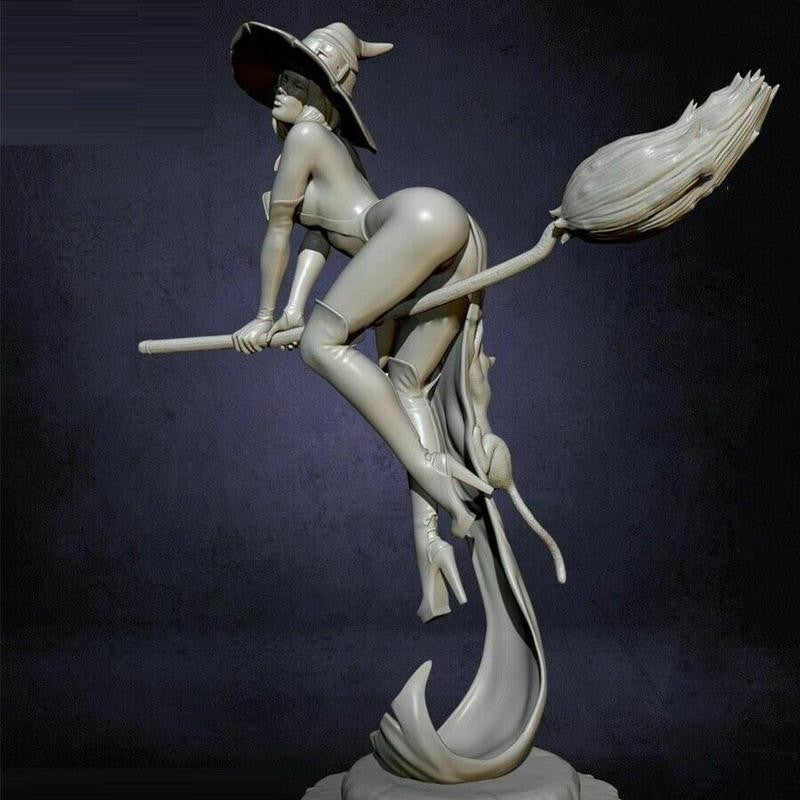 Witch on her broom Figurine