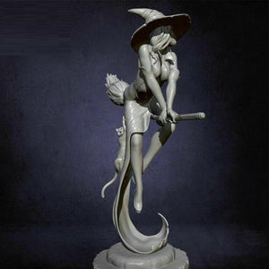 Witch on her broom Figurine